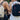 Two people wearing minimalist 8000Kicks hemp backpacks outdoors.