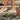 Three people walking up stone steps wearing 8000Kicks hemp slip-on shoes in black, beige, and olive green.