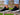 Close up of a woman wearing a pair of black and white hemp shoes by 8000 Kicks.